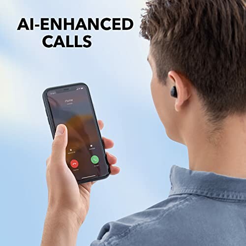 Person holding smartphone with incoming call and wearing earbud for AI-enhanced calls.