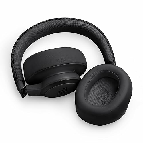 Black over-ear wireless headphones with cushioned ear pads.