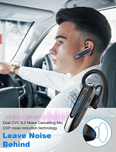 Man wearing a Bluetooth headset with noise cancelling features in a car.