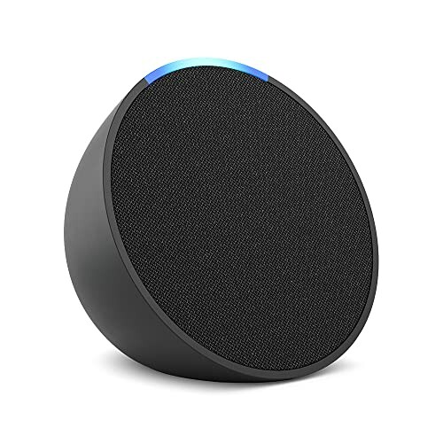 Side view of a black smart speaker with glowing blue light.