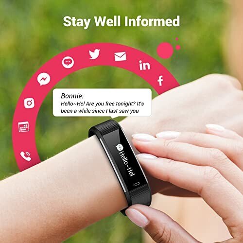 Smartwatch displaying message notification on wrist, with various social media icons in background.