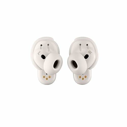 Pair of white wireless earbuds with L and R markings